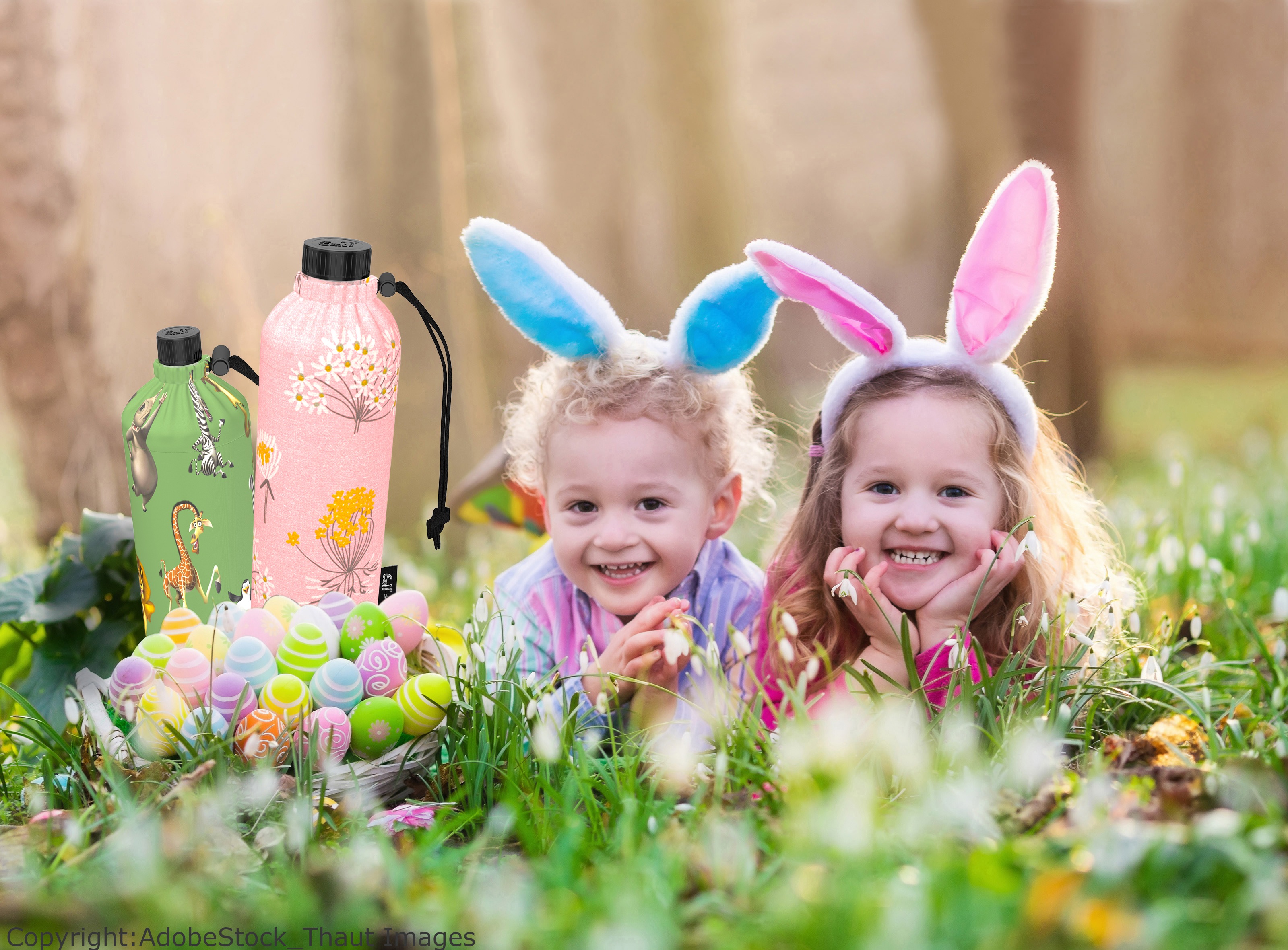Kids on Easter egg hunt in blooming spring garden